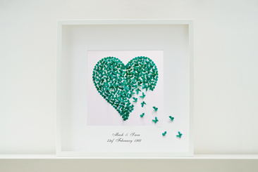 A beautiful artwork that I hand-make for you to order created from jade coloured butterflies that I designed and then cut by hand