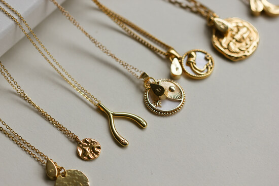 Multiple waterproof & gold vermeil necklaces with initials