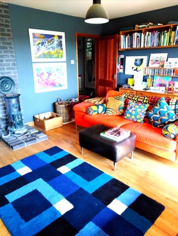 Studio Tuft Blue cheque rug in a colourful decor interiors 