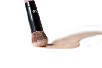 1.1 Domed Foundation brush dipped in foundation