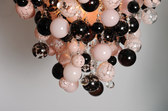 Blown glass chandelier featuring hundreds of individually blown glass spheres in chocolate and pink.  This modern bespoke chandelier glass and crystal beading. 